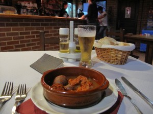 A plate of chorizos in cider and a pint of cold beer - heaven!